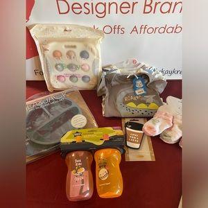 Baby Bundle #2: Onesies, Sippy Cups, Meal Set, Socks, Toy and Teether.